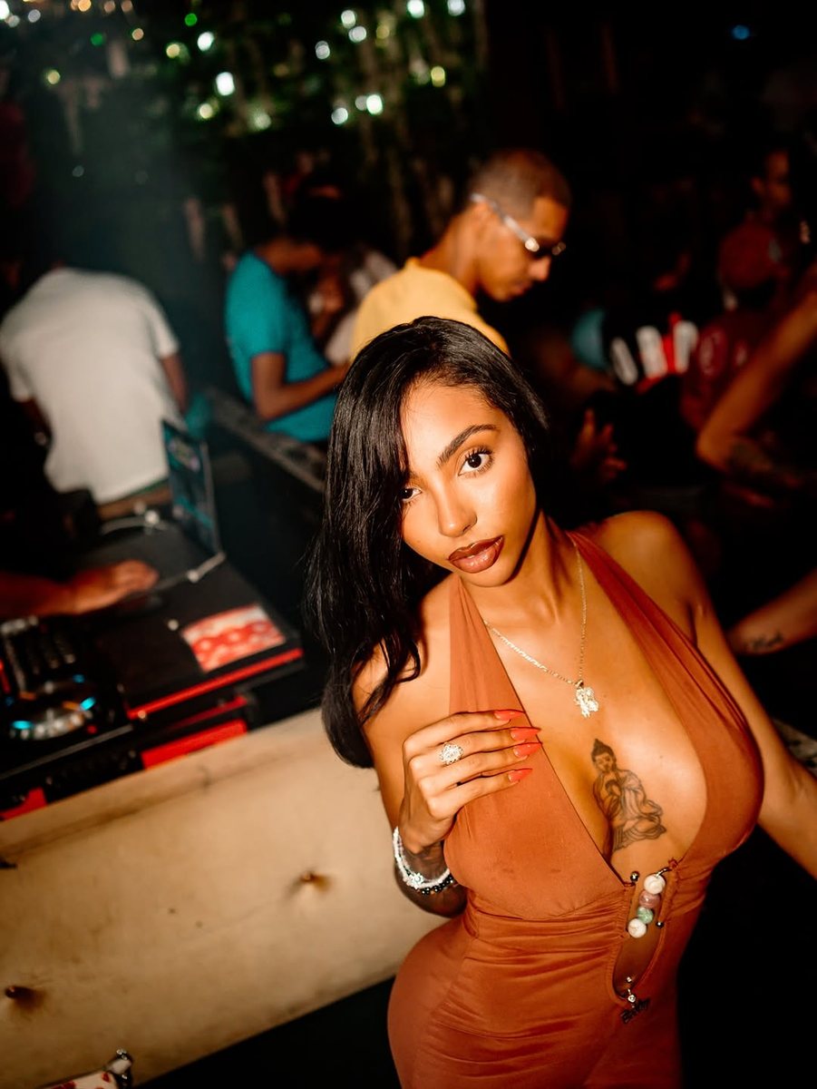 Guest at the DJ booth area during a packed night at The Gallery